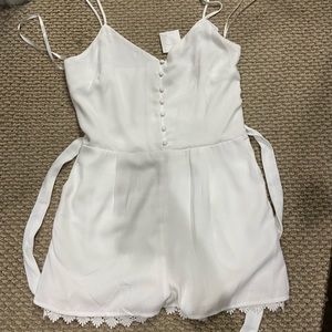 Naked Zebra white jump suit